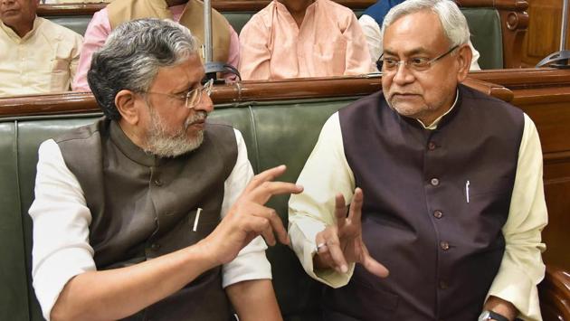 Bihar Chief Minister Nitish Kumar interacts with Deputy Chief Minister Sushil Kumar Modi during the first day of the budget session of State Assembly in Patna on Monday. (PTI) Bihar Chief Minister Nitish Kumar interacts with Deputy Chief Minister Sushil Kumar Modi during the first day of the budget session of State Assembly in Patna on Monday. (PTI)
