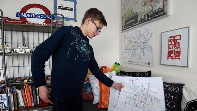 Matej Hosek shows a map that he has designed. (AFP) Matej Hosek shows a map that he has designed. (AFP)