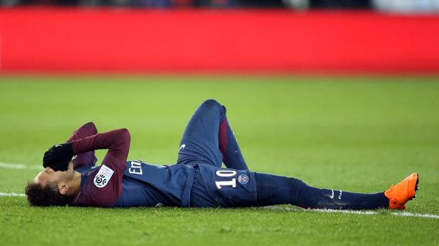 PSG were already 3-0 up and had used all of their substitutes when Neymar rode a tackle from Marseille’s Bouna Sarr and then appeared to roll his right ankle when planting his foot on the ground. (REUTERS) PSG were already 3-0 up and had used all of their substitutes when Neymar rode a tackle from Marseille’s Bouna Sarr and then appeared to roll his right ankle when planting his foot on the ground. (REUTERS)