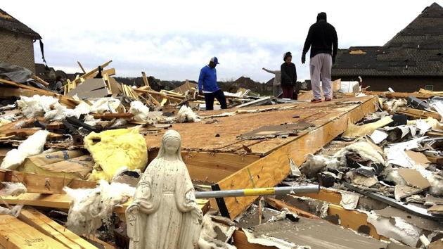 A statue of Mary is among the items volunteers salvaged from the rubble of a destroyed home in Clarksville, Tennessee.(AP Photo) A statue of Mary is among the items volunteers salvaged from the rubble of a destroyed home in Clarksville, Tennessee.(AP Photo)