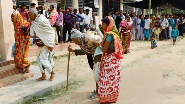 Elderly men accompanied by their family members arrive at a polling booth to cast their vote during the Tripura assembly elections at Dhanpur polling station, some 90km south of Agartala on Monday. (PTI Photo) Elderly men accompanied by their family members arrive at a polling booth to cast their vote during the Tripura assembly elections at Dhanpur polling station, some 90km south of Agartala on Monday. (PTI Photo)