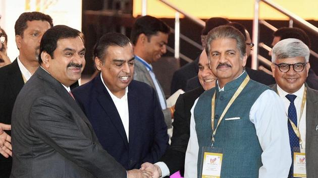 Industrialist Mukesh Ambani, Gautam Adani and Anand Mahindra attend the UP Investors Summit 2018 at Indira Gandhi Pratishthan in Lucknow on February 21, 2018.(PTI File Photo)