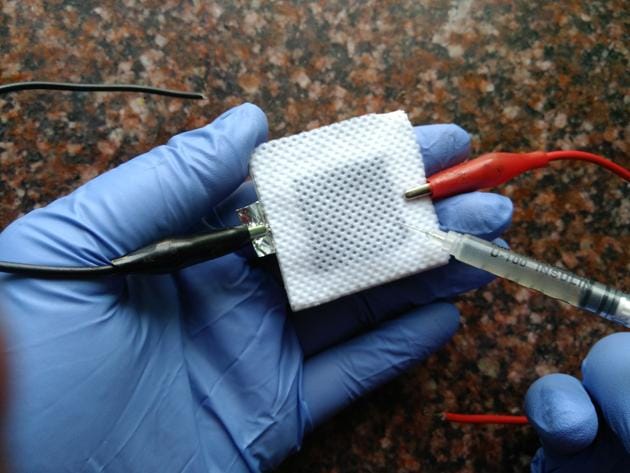 The green battery, created by a PhD student of IIT Kharagpur, uses bacteria to produce electricity. The green battery, created by a PhD student of IIT Kharagpur, uses bacteria to produce electricity.