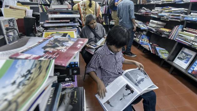 In the days leading up to its closure, children and adults occupied every inch of floor space at Strand. The store never donned dramatic picture-window displays that are the mainstay of bookstore design now. Author Amish Tripathi, recalls dropping in as a student of the nearby Cathedral and John Connon School. “I read more non-fiction growing up, but most of the fiction I read was from this bookstore,” he said. (Kunal Patil / HT Photo) In the days leading up to its closure, children and adults occupied every inch of floor space at Strand. The store never donned dramatic picture-window displays that are the mainstay of bookstore design now. Author Amish Tripathi, recalls dropping in as a student of the nearby Cathedral and John Connon School. “I read more non-fiction growing up, but most of the fiction I read was from this bookstore,” he said. (Kunal Patil / HT Photo)