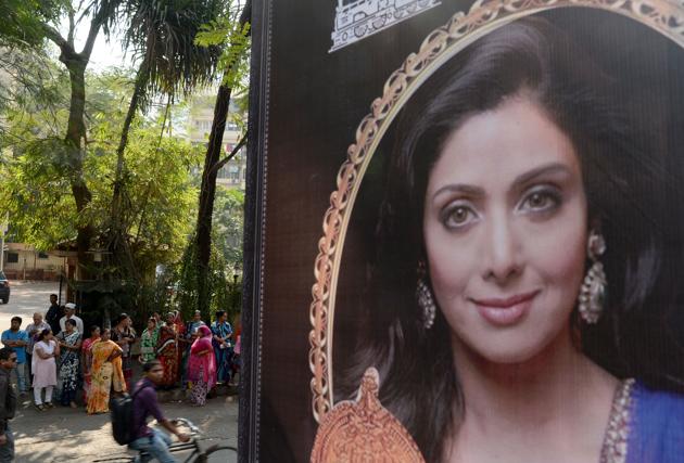 A picture of Bollywood actor Sridevi Kapoor is seen put up outside her residence in Mumbai. Her mortal remains are expected to reach India on Tuesday, as the family has received her body from the authorities.The probe launched into her death by Dubai’s prosecution department has been closed. (Punit Paranjpe / AFP)