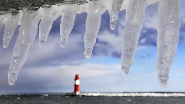 Icicles seen in the Baltic Sea harbor of Warnemuende near Rostock, Germany. Some local authorities in Europe have ordered officials to find shelters for the homeless. In Belgium, a local mayor in Brussels ordered homeless people to be forcibly detained if they refused to go to shelters. (Bernd Wuestneck / dpa via AP) Icicles seen in the Baltic Sea harbor of Warnemuende near Rostock, Germany. Some local authorities in Europe have ordered officials to find shelters for the homeless. In Belgium, a local mayor in Brussels ordered homeless people to be forcibly detained if they refused to go to shelters. (Bernd Wuestneck / dpa via AP)