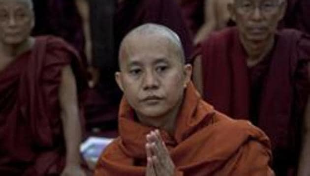 Wirathu (C), a Buddhist monk from Mandalay whose anti-Muslim remarks have come under recent scrutiny, attends a conference about the religious violence that has shaken the country at a monastery on the outskirts of Yangon. (AFP File Photo) Wirathu (C), a Buddhist monk from Mandalay whose anti-Muslim remarks have come under recent scrutiny, attends a conference about the religious violence that has shaken the country at a monastery on the outskirts of Yangon. (AFP File Photo)