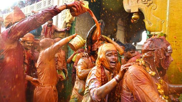 It is nigh impossible to escape the bursts of colour during the week long celebrations, punctuated with songs, dance and the drinking of thandai –all elements synonymous with Holi. (Ajay Aggarwal / HT Photo) 