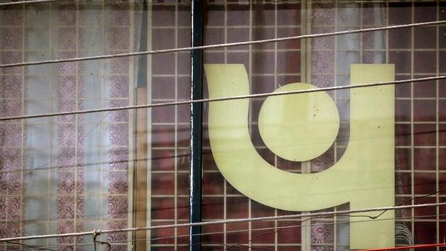 The logo of Punjab National Bank (PNB) is seen on a branch office window in New Delhi on February 27. (Reuters) The logo of Punjab National Bank (PNB) is seen on a branch office window in New Delhi on February 27. (Reuters)