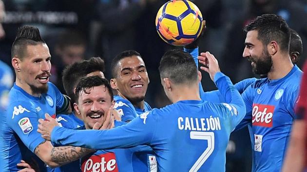 Napoli footballers celebrate after scoring a goal against Cagliari in their Serie A encounter on Monday. (REUTERS) Napoli footballers celebrate after scoring a goal against Cagliari in their Serie A encounter on Monday. (REUTERS)