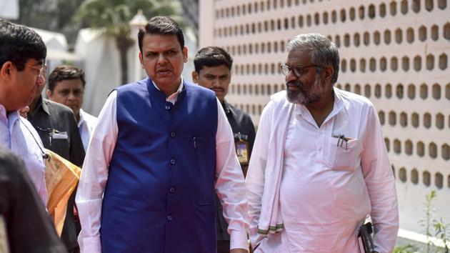 Maharashtra Chief Minister Devendra Fadnavis and BJP leader Pasha Patel during the Maharashtra State Assembly at Vidhan Bhavan on Wednesday.(Kunal Patil/HT Photo)