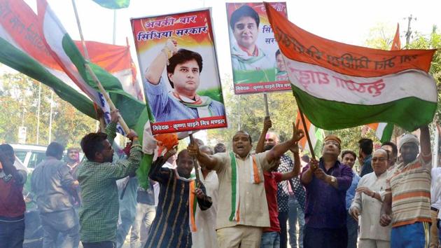 Congress workers celebrate the win in Kolaras and Mungaoli assembly by-elections at the party’s headquarters in Bhopal on Wednesday. (PTI Photo) Congress workers celebrate the win in Kolaras and Mungaoli assembly by-elections at the party’s headquarters in Bhopal on Wednesday. (PTI Photo)