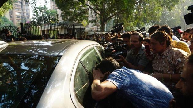 A fan is trying to see Anil Kapoor and Sanjay Kapoor through the car window outside Sridevi’s Lokhandwala residence. (Santosh Harhare/Hindustan Times) A fan is trying to see Anil Kapoor and Sanjay Kapoor through the car window outside Sridevi’s Lokhandwala residence. (Santosh Harhare/Hindustan Times)