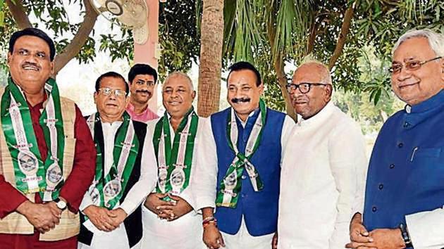 Bihar chief minister Nitish Kumar with former state Congress chief Ashok Choudhary (third from right) and three other MLCs after they joined the Janata Dal (United) in Patna on Thursday. (PTI Photo) Bihar chief minister Nitish Kumar with former state Congress chief Ashok Choudhary (third from right) and three other MLCs after they joined the Janata Dal (United) in Patna on Thursday. (PTI Photo)