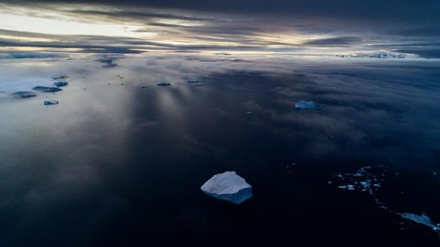 This handout picture released by Greenpeace on January 24, 2018 shows glacier front and icebergs at Joinville Island, facing the Antarctic Sound at the opening of the Weddell Sea during a submarine-based scientific research.(AFP) This handout picture released by Greenpeace on January 24, 2018 shows glacier front and icebergs at Joinville Island, facing the Antarctic Sound at the opening of the Weddell Sea during a submarine-based scientific research.(AFP)