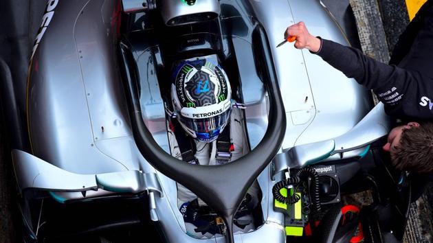 Mercedes F1 team's Valtteri Bottas rests in the pits at the Circuit de Catalunya on the outskirts of Barcelona during the fourth day of the Formula One pre-season tests on Thursday. (AFP) Mercedes F1 team's Valtteri Bottas rests in the pits at the Circuit de Catalunya on the outskirts of Barcelona during the fourth day of the Formula One pre-season tests on Thursday. (AFP)