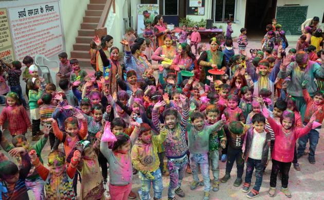 Students of DAVCP school Mandi celebrating Holi in the school campus. The festival marks the victory of good over evil. (Birbal sharma/ht ) Students of DAVCP school Mandi celebrating Holi in the school campus. The festival marks the victory of good over evil. (Birbal sharma/ht )