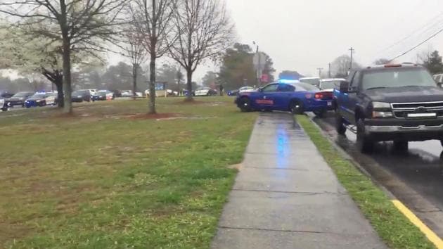 Police cars are stationed outside Dalton High School in this still image taken from a video obtained on social media. (@jordankirkland0 via Reuters Photo) Police cars are stationed outside Dalton High School in this still image taken from a video obtained on social media. (@jordankirkland0 via Reuters Photo)