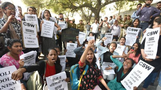 Students and teachers of Jesus and Mary College protest outside Delhi Police headquarters against an incident in which semen-filled balloons were allegedly thrown at some girl students. (Sonu Mehta/HT PHOTO) Students and teachers of Jesus and Mary College protest outside Delhi Police headquarters against an incident in which semen-filled balloons were allegedly thrown at some girl students. (Sonu Mehta/HT PHOTO)