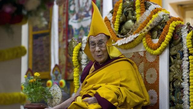 Tibetan spiritual leader the Dalai Lama wears his ceremonial yellow hat as he attends a special prayer for his longevity in Dharmsala on Thursday. Hundreds of nuns from different nunneries in exile attended the prayers. (Ashwini Bhatia / AP) Tibetan spiritual leader the Dalai Lama wears his ceremonial yellow hat as he attends a special prayer for his longevity in Dharmsala on Thursday. Hundreds of nuns from different nunneries in exile attended the prayers. (Ashwini Bhatia / AP)