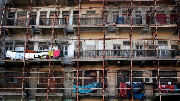 Bamboo scaffolding is fixed to a colonial building. Karachi’s population has skyrocketed to nearly 17 million people in 2017 from an estimated 400,000 at independence, and every inch of the city has become a valuable commodity for developers building homes or drafting plans to alter the city’s skyline with skyscrapers. (Akhtar Soomro / REUTERS) Bamboo scaffolding is fixed to a colonial building. Karachi’s population has skyrocketed to nearly 17 million people in 2017 from an estimated 400,000 at independence, and every inch of the city has become a valuable commodity for developers building homes or drafting plans to alter the city’s skyline with skyscrapers. (Akhtar Soomro / REUTERS)