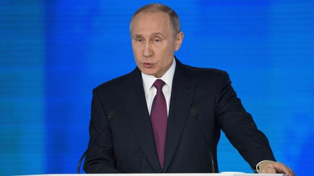 Russian President Vladimir Putin gives his annual state of the nation address in Manezh in Moscow on Thursday.(AP Photo)