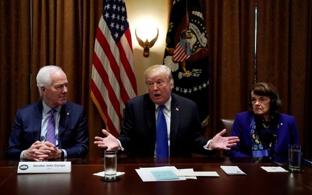 US President Donald Trump with senators John Cornyn and Dianne Feinstein at the White House. (Reuters) US President Donald Trump with senators John Cornyn and Dianne Feinstein at the White House. (Reuters)