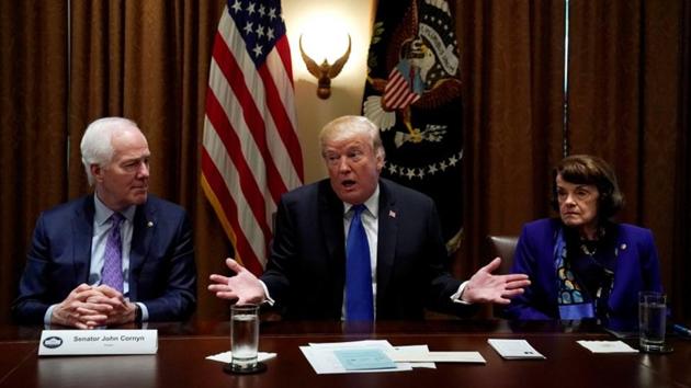 Flanked by Senators John Cornyn (R-TX) and Dianne Feinstein (D-CA) US President Donald Trump meets with bi-partisan members of Congress to discuss school and community safety in the wake of the Florida school shootings at the White House in Washington (REUTERS Photo) Flanked by Senators John Cornyn (R-TX) and Dianne Feinstein (D-CA) US President Donald Trump meets with bi-partisan members of Congress to discuss school and community safety in the wake of the Florida school shootings at the White House in Washington (REUTERS Photo)