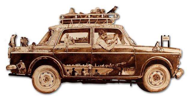 Mumbai Darshan by Ahmedabad-based Mehul Rathod employs pyrography on wood to recreate a city taxi. Mumbai Darshan by Ahmedabad-based Mehul Rathod employs pyrography on wood to recreate a city taxi.