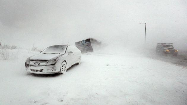 On Thursday, thousands of drivers, who ignored warnings not to go out, or had no option but to brave the snow and ice, were left stranded on roads across the UK in freezing temperatures. (Owen Humphreys / AP)