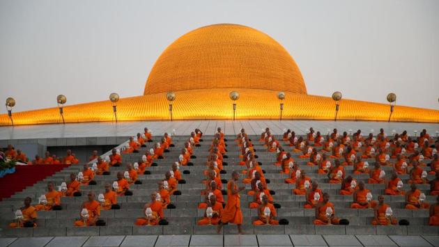 Buddhist monks attend a ceremony on Makha Bucha Day at Wat Phra Dhammakaya in Pathum Thani, Thailand. (Athit Perawongmetha / REUTERS) 