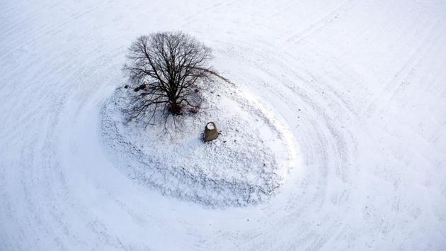 Adding to the problems in Britain, a storm system heading up from the south is colliding with the Siberian air mass, bringing as much as 2 feet of drifting snow amid blizzard conditions. (AFP)