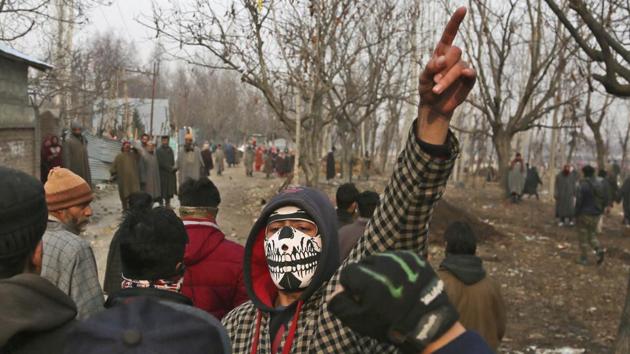 Villagers shout slogans in a procession in militancy-hit Kashmir on December 19, 2017. Four Kashmiri youngsters, who had taken to militancy, shunned the path of violence and returned to the mainstream in 2017. (AP FILE) Villagers shout slogans in a procession in militancy-hit Kashmir on December 19, 2017. Four Kashmiri youngsters, who had taken to militancy, shunned the path of violence and returned to the mainstream in 2017. (AP FILE)