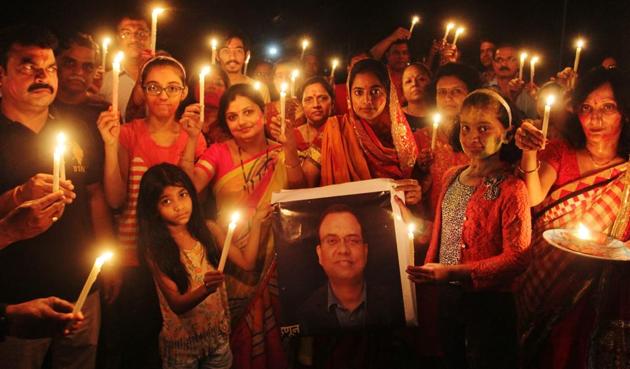 Residents take part in the candlelight vigil at Thane. (Praful Gangurde) Residents take part in the candlelight vigil at Thane. (Praful Gangurde)