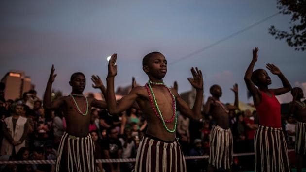 Dancers perform during celebrations marking the Chinese New Year, the Year of the Dog, in First Chinatown, Johannesburg. (Gulshan Khan / AFP) 