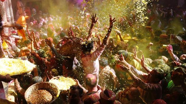Devotees and revellers from across the globe gathered to celebrate Holi at Banke Bihari Temple in Vrindavan on Tuesday. (Sanchit Khanna / HT Photo) Devotees and revellers from across the globe gathered to celebrate Holi at Banke Bihari Temple in Vrindavan on Tuesday. (Sanchit Khanna / HT Photo)