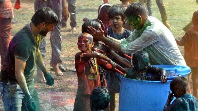 Kids and youngsters celebrate Holi, the festival of colours, on Friday. (ht photo) Kids and youngsters celebrate Holi, the festival of colours, on Friday. (ht photo)
