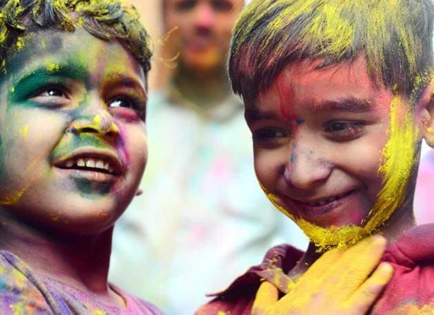 Children during the Holi celebrations in the city on Friday. (shankar narayan/ht photo) Children during the Holi celebrations in the city on Friday. (shankar narayan/ht photo)
