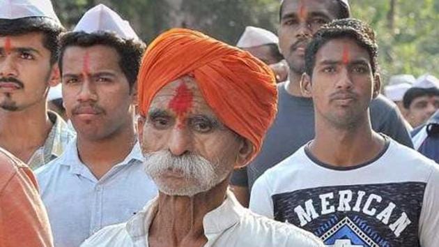 Sambhaji Bhide (foreground, orange turban) is charged with inciting violence at Koregaon Bhima. (FILE) Sambhaji Bhide (foreground, orange turban) is charged with inciting violence at Koregaon Bhima. (FILE)