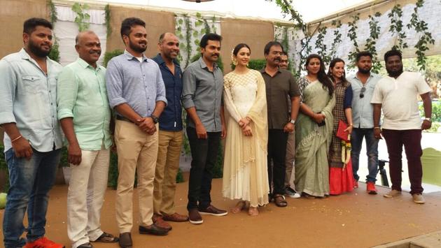 Karthi, Rakul Preet Singh and Suriya at the pooja ceremony held on Saturday. Karthi, Rakul Preet Singh and Suriya at the pooja ceremony held on Saturday.