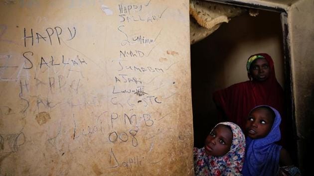 Fatima Dala’s mother and sisters stand by a wall covered in her writings at their home, in Jumbam village, Nigeria. Fatima was among the 110 students abducted by Boko Haram militants from the Government Girls Science and Technical College in Dapchi, a dusty, remote town in the northeast Nigerian state of Yobe on February 19. (Afolabi Sotunde / REUTERS) Fatima Dala’s mother and sisters stand by a wall covered in her writings at their home, in Jumbam village, Nigeria. Fatima was among the 110 students abducted by Boko Haram militants from the Government Girls Science and Technical College in Dapchi, a dusty, remote town in the northeast Nigerian state of Yobe on February 19. (Afolabi Sotunde / REUTERS)