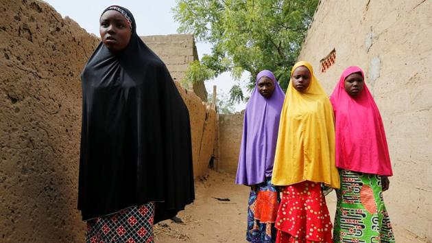 Amina Usman (L), a 15-year-old was among the pupils who escaped the jihadist group whose name roughly translates as “Western education is forbidden” in the Hausa language widely spoken in northern Nigeria. “I thought I will never see my parents or family again alive. I thought that was going to be the end of my life,” she said. (Afolabi Sotunde / REUTERS) Amina Usman (L), a 15-year-old was among the pupils who escaped the jihadist group whose name roughly translates as “Western education is forbidden” in the Hausa language widely spoken in northern Nigeria. “I thought I will never see my parents or family again alive. I thought that was going to be the end of my life,” she said. (Afolabi Sotunde / REUTERS)