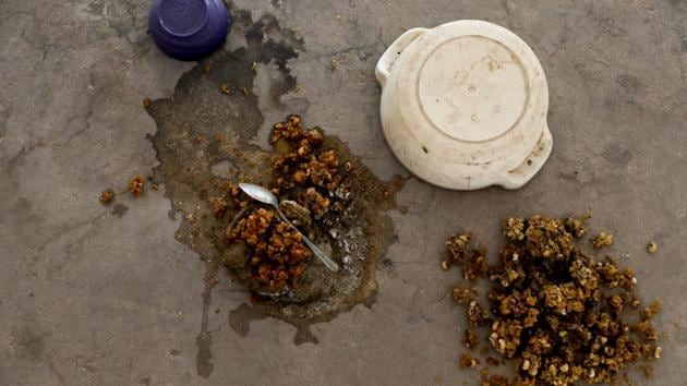 Remnants of the last meal served to students before men shouting and brandishing weapons attacked the school, lie on the ground at the Government Girls Science and Technical College in Dapchi. (Afolabi Sotunde / REUTERS) Remnants of the last meal served to students before men shouting and brandishing weapons attacked the school, lie on the ground at the Government Girls Science and Technical College in Dapchi. (Afolabi Sotunde / REUTERS)