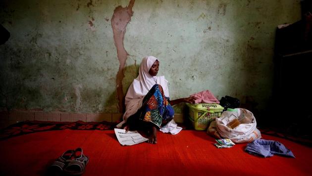 Adama Mustapha, mother of Salamutu, Fatima and Maryam Mustapha, all missing students of the attack, sits near her daughters' clothing and provisions at her house in Dapchi. The abductions may be one of the largest since Boko Haram took more than 270 schoolgirls from Chibok in 2014. That case sparked an online campaign and spurred several governments into action to try and find them. (Afolabi Sotunde / REUTERS) Adama Mustapha, mother of Salamutu, Fatima and Maryam Mustapha, all missing students of the attack, sits near her daughters' clothing and provisions at her house in Dapchi. The abductions may be one of the largest since Boko Haram took more than 270 schoolgirls from Chibok in 2014. That case sparked an online campaign and spurred several governments into action to try and find them. (Afolabi Sotunde / REUTERS)