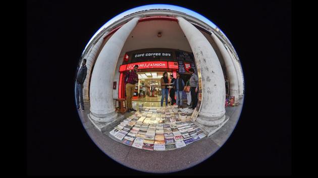Over the decades, CP has presented itself not just as a shopping district for high end retail, but also as a destination for those love old and new books sold on pavements. (Burhaan Kinu / HT Photo) Over the decades, CP has presented itself not just as a shopping district for high end retail, but also as a destination for those love old and new books sold on pavements. (Burhaan Kinu / HT Photo)