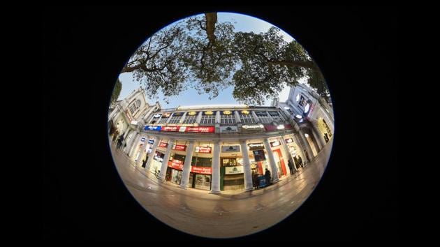 Connaught Place (CP) and Delhi might as well be interchangeable for the tourist. The city’s prime commercial district, it was a ridge, covered with kikar trees and populated with jackals and wild pigs until the early 1920s. HT photographer Burhaan Kinu takes a walk in CP with a fisheye lens to show its expanse. (Burhaan Kinu / HT Photo) Connaught Place (CP) and Delhi might as well be interchangeable for the tourist. The city’s prime commercial district, it was a ridge, covered with kikar trees and populated with jackals and wild pigs until the early 1920s. HT photographer Burhaan Kinu takes a walk in CP with a fisheye lens to show its expanse. (Burhaan Kinu / HT Photo)