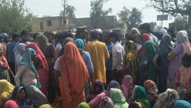 Locals protest after the incident that left two dead. Locals protest after the incident that left two dead.