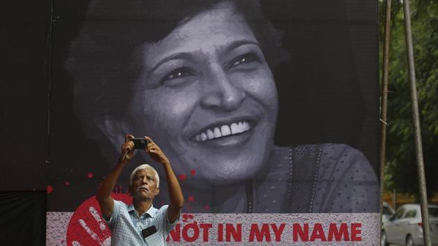 Journalist Gauri Lankesh was found murdered outside her house in Bengaluru on September 5, 2017. She had been shot four times by an assailant wearing a helmet, police investigation revealed. (AP) Journalist Gauri Lankesh was found murdered outside her house in Bengaluru on September 5, 2017. She had been shot four times by an assailant wearing a helmet, police investigation revealed. (AP)