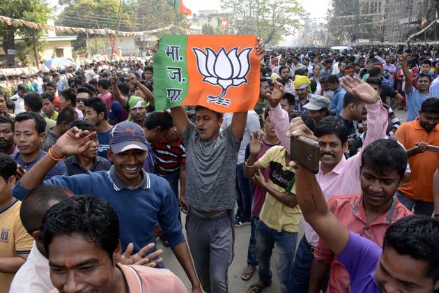 Bharatiya Janata Party supporters celebrate the party’s win in Tripura, in Agartala on March 3, 2018. In Nagaland, the BJP has a lead in around 10 seats. (AFP) Bharatiya Janata Party supporters celebrate the party’s win in Tripura, in Agartala on March 3, 2018. In Nagaland, the BJP has a lead in around 10 seats. (AFP)