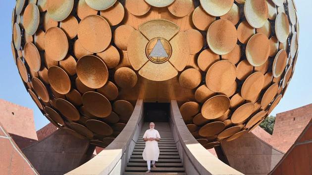 Narendra Modi walks out from the Matrimandir monument during celebrations to mark Auroville's 50 year anniversary in Tamil Nadu. The experimental township was conceived as a “universal town” in 1968, and was intended to house some 50,000 residents from around the world. (Arun Sankar / AFP) Narendra Modi walks out from the Matrimandir monument during celebrations to mark Auroville's 50 year anniversary in Tamil Nadu. The experimental township was conceived as a “universal town” in 1968, and was intended to house some 50,000 residents from around the world. (Arun Sankar / AFP)